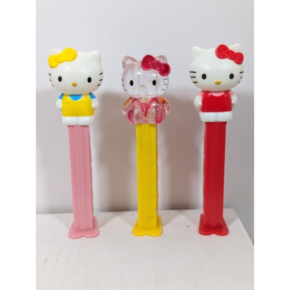 PEZ Hello Kitty Crystal Yellow Stem, Red W Red Stem, Yellow W Pink Stem Lot Of 3 - Picture 1 of 7
